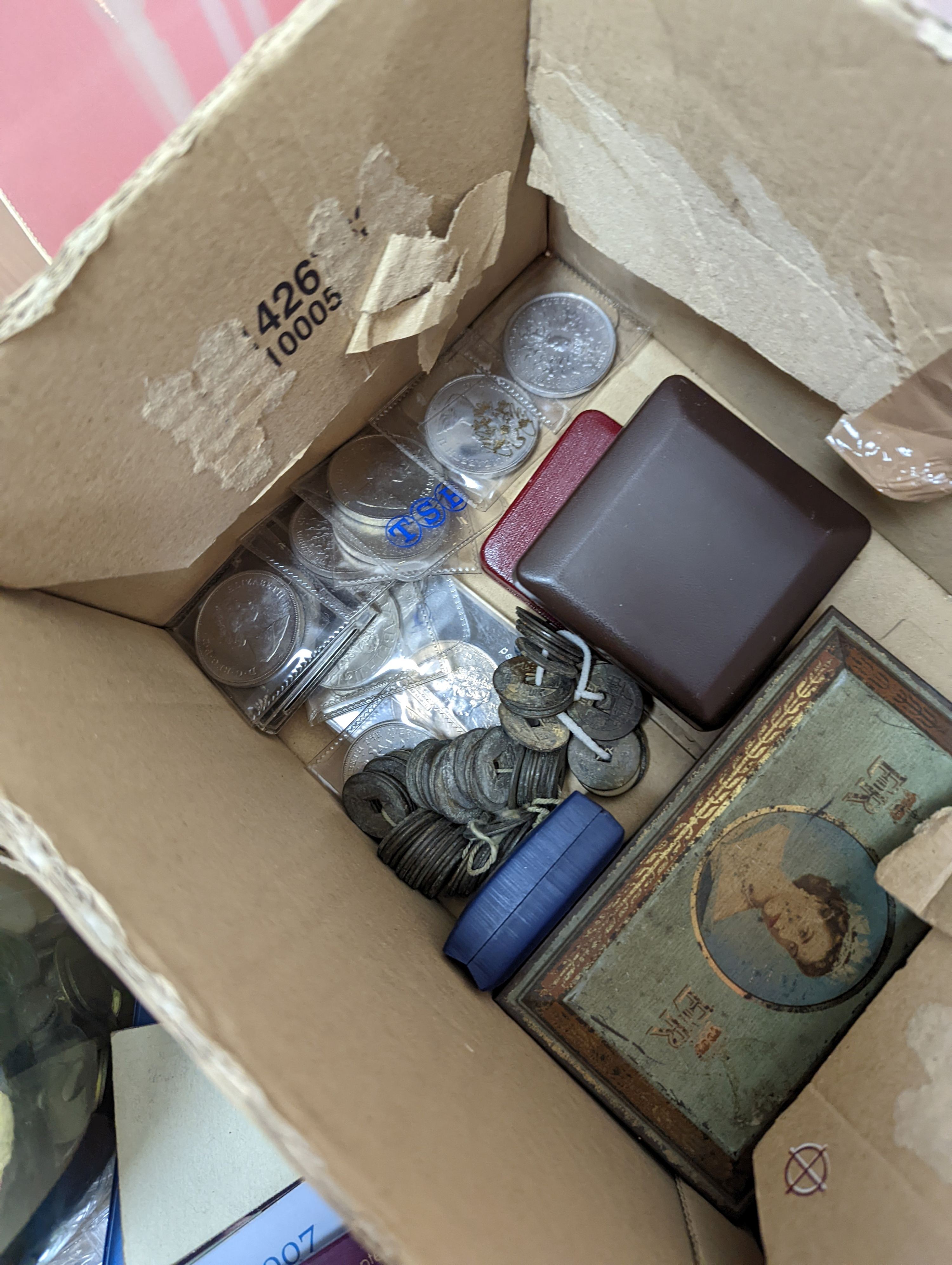 A large collection of coins, etc.